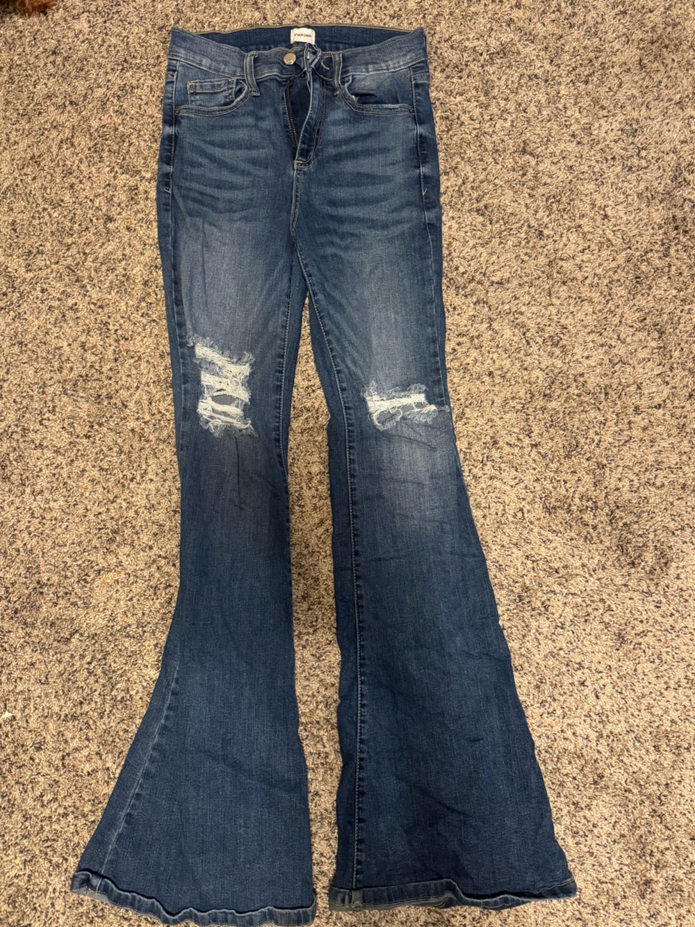 Sneak peak flare jeans